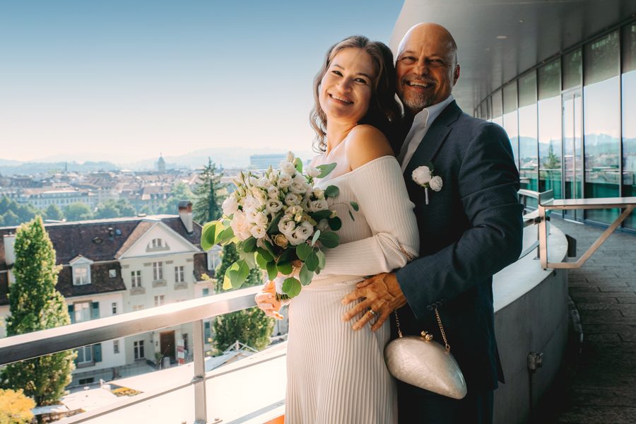 Joyful wedding reception moment — guests celebrating together