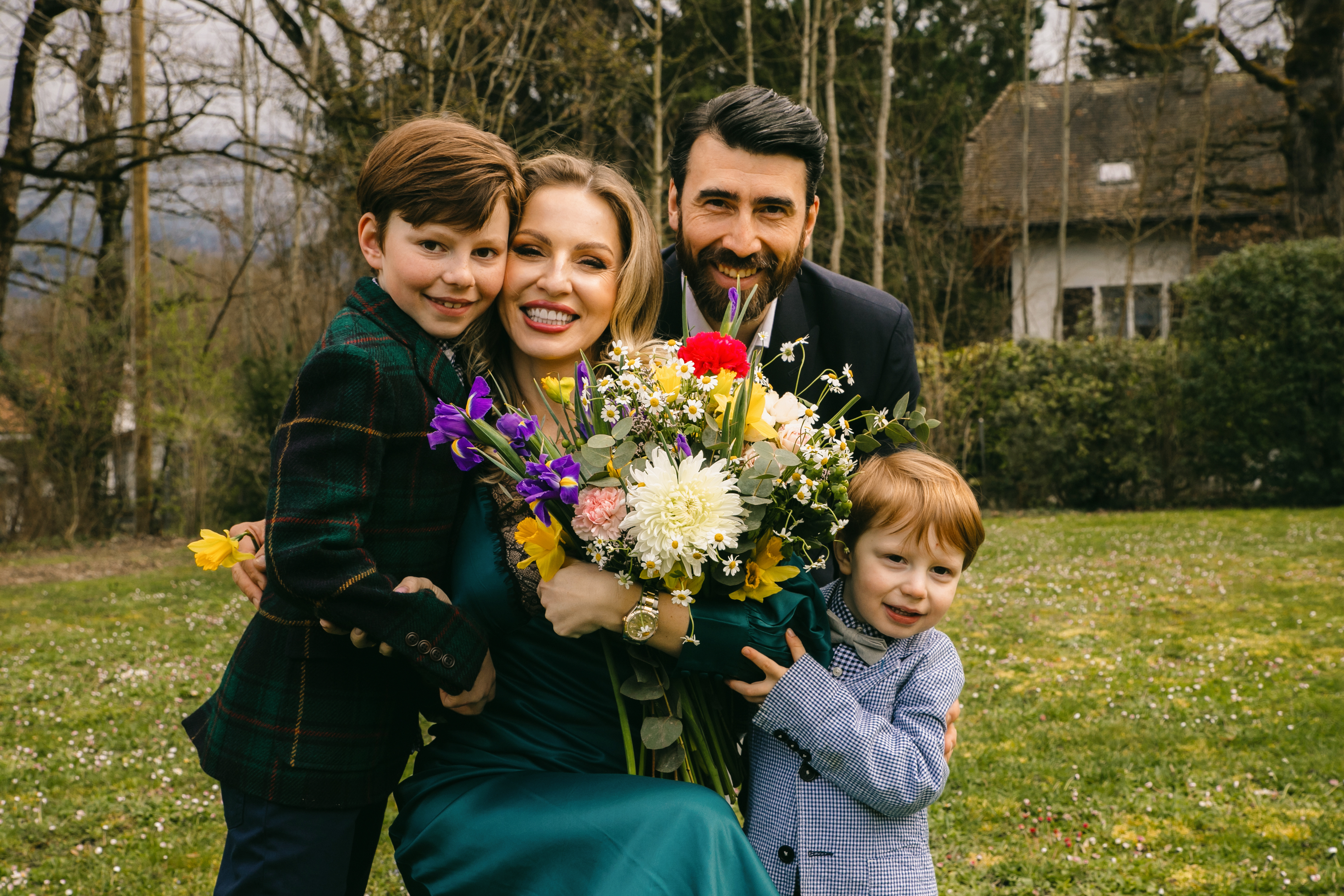 Elegant family portrait in coordinated neutral tones, Lausanne