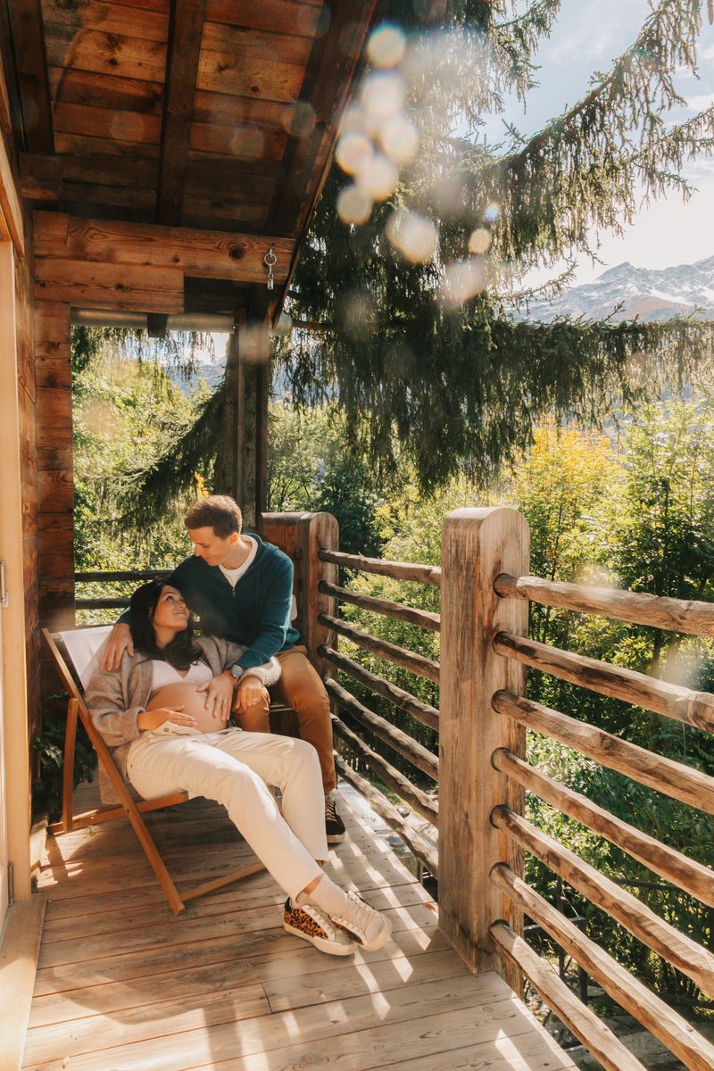Romantic maternity session with soft draping and natural light